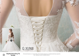 Detail of elegant bridal gown featuring V-back cross-lace ribbons and floral embroidery