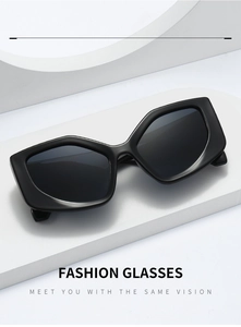 Macro detail of fashionable black hexagonal sunglasses on minimalist geometric display