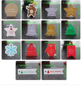 Macro display of colorful Christmas gift tags in various festive shapes and sizes