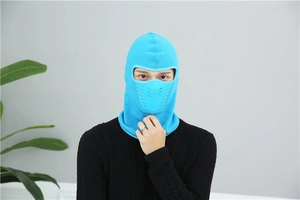 Close-up of bright blue winter cycling face mask with breathable valve and fleece material