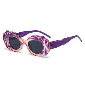 Lunettes steampunk roses avec textures florales 3D et verres UV pour look festif