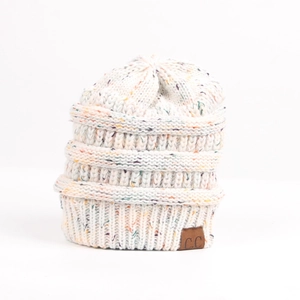 Winter warm cable knit beanie hat in cream white with colorful speckled pattern and leather patch