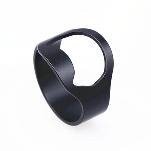 Detailed close-up of a matte black stainless steel ring bottle opener for men