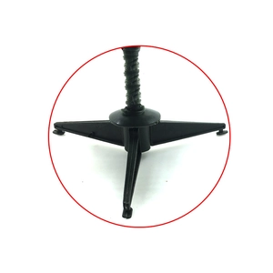 Detail view of a sturdy black tripod base for a 30cm to 60cm mini Christmas tree