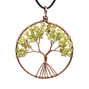 Detailed tree of life pendant with copper wire wrap and green gemstone chips