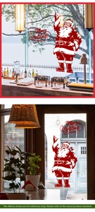 Détail du sticker Père Noël rouge et Merry Christmas sur une vitre pour la décoration