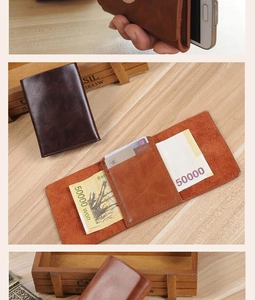 Detail of vintage PU leather wallet showing large banknote compartment and card slots
