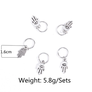 Detailed view of silver Hamsa Hand hair ring charms showing 1.6cm size and 5.8g weight