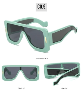 Detailed views of mint green oversized square sunglasses with wave geometric temples