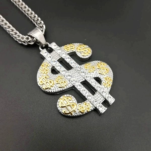 Hip-hop silver Cuban chain with large dollar sign pendant featuring gold accents and crystals