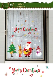 Detail of Christmas window stickers featuring guitar Santa and singing reindeer set