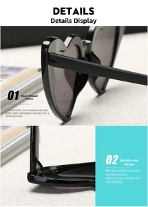 Detail view of heart-shaped sunglasses featuring reinforced metal hinges and glossy frames