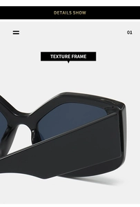 Detailed view of the thick black geometric frame and high-quality texture on sunglasses