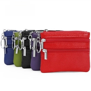 Detailed view of genuine leather wallets in five colors with three-layer zipper design