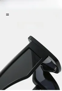 Detail shot of lightweight, super elastic black square sunglasses with glossy finish