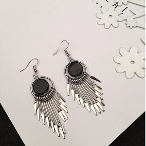 Elegant bohemian drop earrings with black circular studs and silver metal tassel fringe