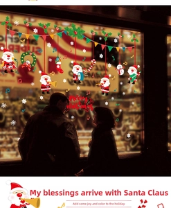 Detail of Merry Christmas window stickers with Santa musicians and colorful snowflakes
