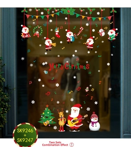 Detailed Christmas window stickers showing Santa playing guitar with reindeer and snowman