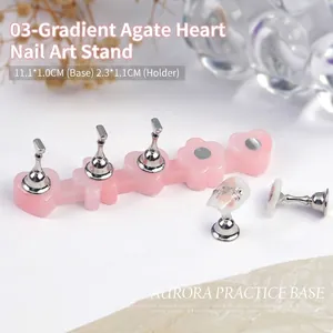 Macro view of pink agate resin nail art practice stand with magnetic metal holders
