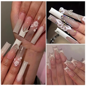 Luxury 3D silver bowknot metal nail charms and rhinestones on long French square nails