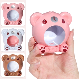 Miniature bear-shaped ceramic hamster hideout available in pink, white and brown colors