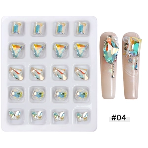 Macro detail of mixed AB crystal nail rhinestones in assorted shapes on a nude nail