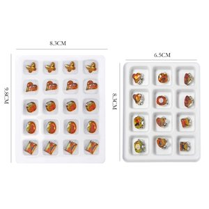 Maillard autumn nail rhinestones in amber and brown crystal shapes with white storage cases