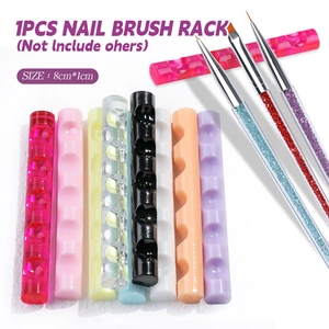 Detail showing colorful acrylic 5-slot nail art brush holders in various vibrant colors