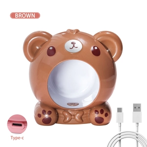 Detail showing the Type-C charging port and USB cable of the brown bear nail lamp