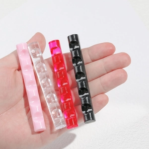 Set of 4 portable 5-slot acrylic nail brush holders in pink, clear, red, and black