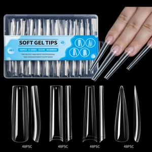 Macro detail of 192pcs transparent soft gel nail tips in long ballet and square shapes