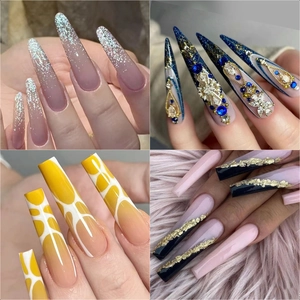 Extra long coffin and stiletto press-on nails with glitter, rhinestones, and patterns