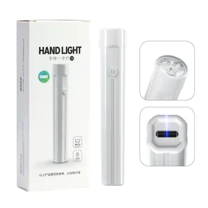 Detail showing white handheld UV LED nail lamp with power button and dual timing modes