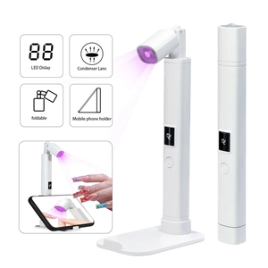 Portable white UV LED nail lamp with LCD display and folding stand for home manicure