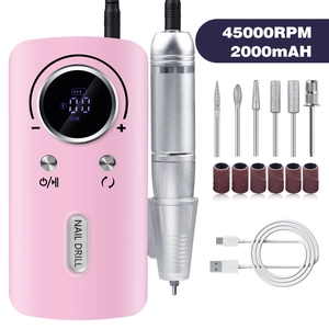 Detail of pink electric nail drill set with 45000RPM digital display and 6 metal bits