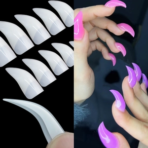 Macro detail of long claw-shaped artificial nails in neon pink and lavender purple colors