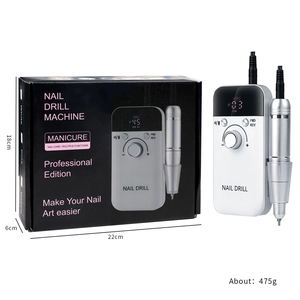 Portable 45000 RPM electric nail drill set with white digital control box and silver handpiece