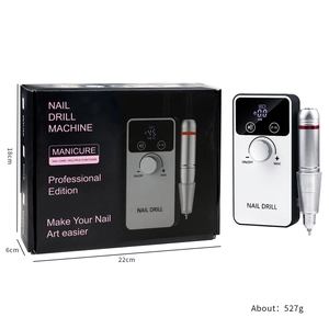 Professional nail drill kit with digital display and metallic handpiece in retail box