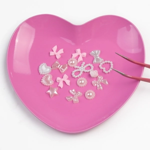 Heart-shaped stainless steel tray with mixed resin charms and pink tweezers set