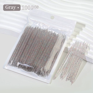 Detail of 100 grey glitter acrylic nail sticks showing pointed tips and sparkly texture