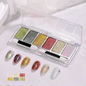 Vista de paleta de 6 polvos para uñas con efecto purpurina y pinceles aplicadores