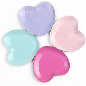 Set of four heart-shaped stainless steel trays in macaron purple, pink, blue, and rose colors