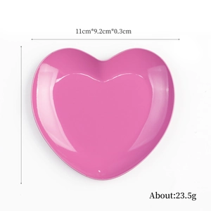 Pink heart-shaped stainless steel jewelry tray with polished finish, 11cm x 9.2cm size