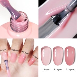 Macro shot of nude pink jelly nail polish showing color opacity from one to four layers