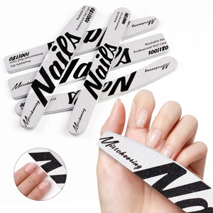 Macro detail of professional 100/180 grit double-sided washable nail file for manicure