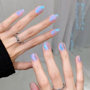 Macro close-up of blue cat eye nail polish showing shimmer and magnetic light effects