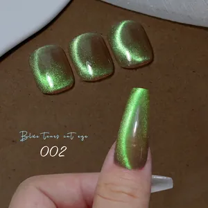 Macro detail of Blue Tears Cat Eye nail polish 002 showing emerald shimmer and light effect