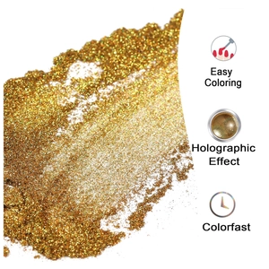 Detailed view of holographic gold nail glitter powder with high shine and colorfast features