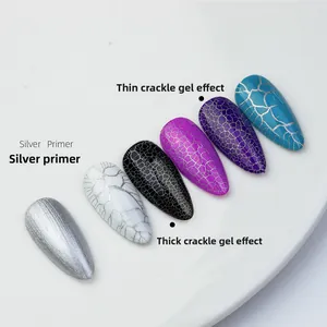 Macro detail of crackle effect nail polish on silver primer with various color textures