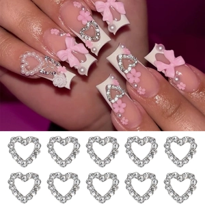 Hollow heart-shaped nail charms with silver metal plating and clear zircon crystals